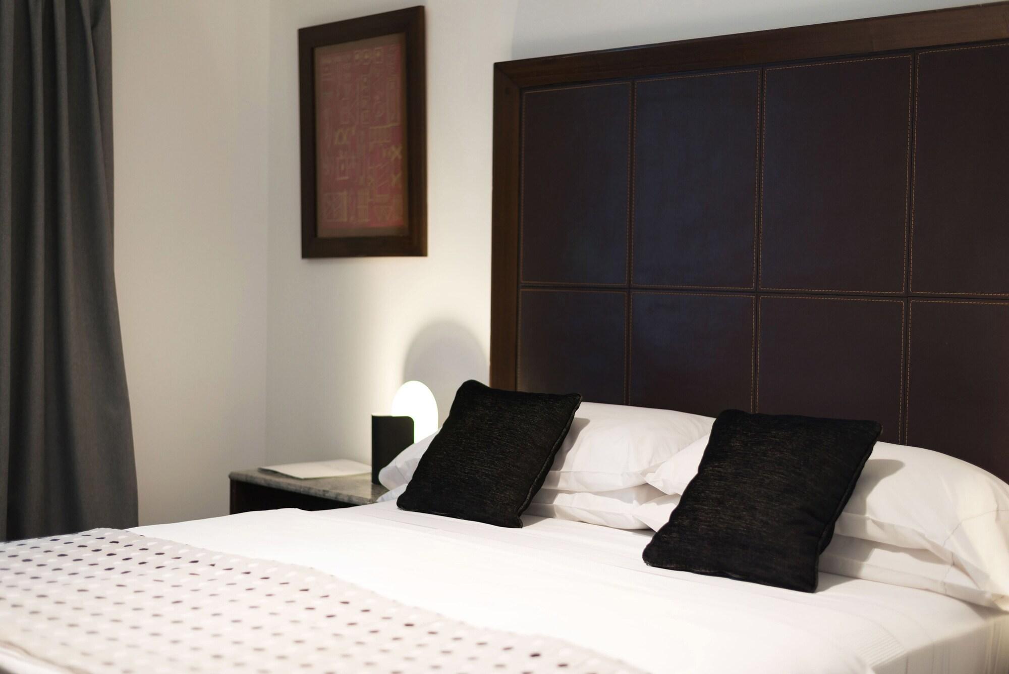 Hotel Tolosa ปูแอร์โตมาดริน ภายนอก รูปภาพ